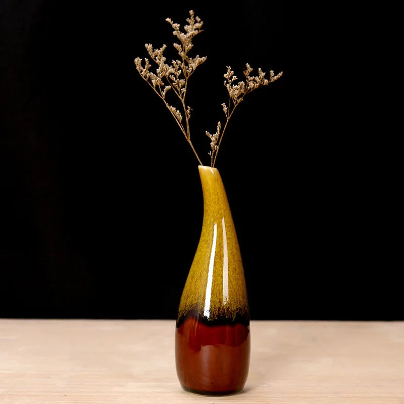 Mini Boho Vase with a gradient design on a wooden surface and black background