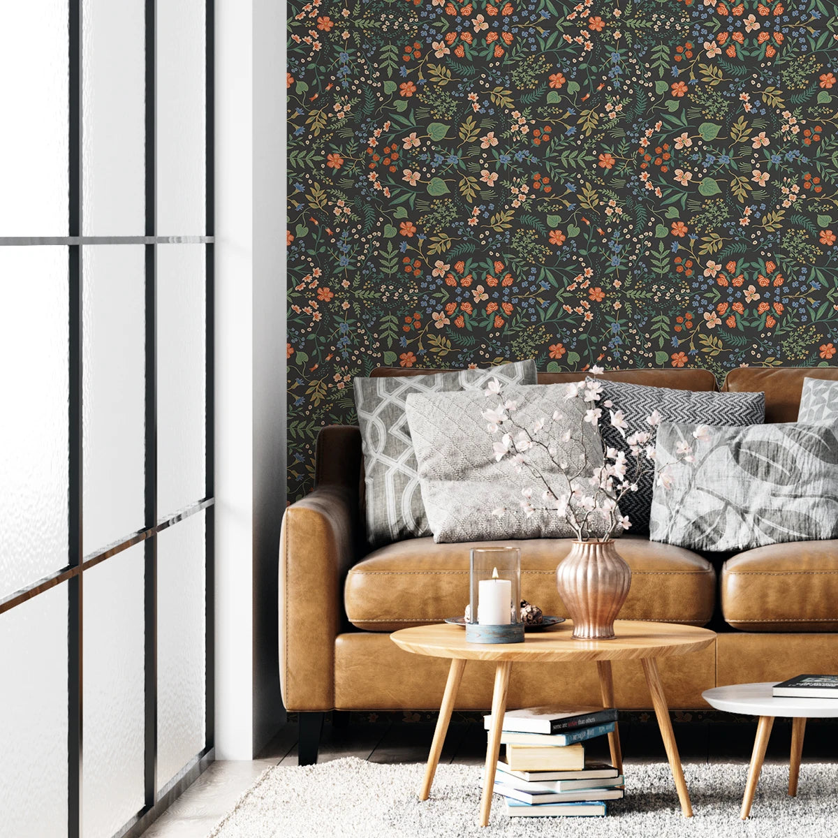 Living room with brown sofa, floral wallpaper, and decorative items. Black floral peel-and-stick wallpaper roll, 40 x 120 cm, waterproof and moisture-proof wall covering for stylish home decoration