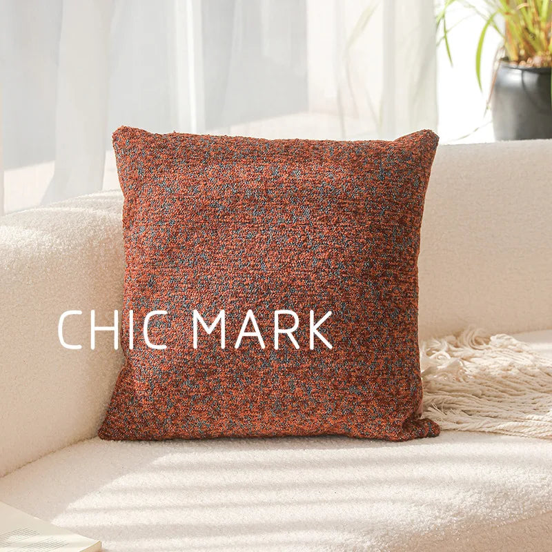 Textured pillow with 'CHIC MARK' branding on a beige couch. Modern yarn-dyed throw pillow cover, luxury textured decorative cushion for sofa, bed, or window seating in soft neutral tones.