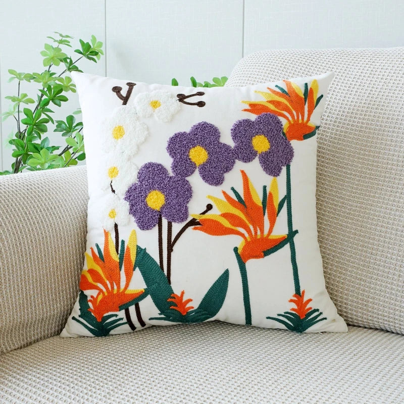 Decorative pillow with floral design on a couch. Floral embroidered throw pillow cover boho decor