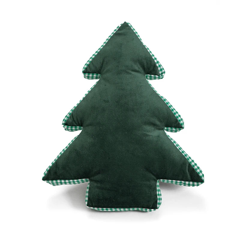 Green tree-shaped pillow with checkered trim on a white background
