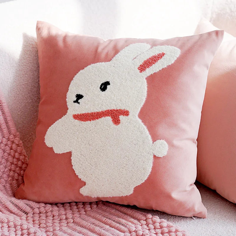 Pink pillow with a bunny design on a soft pink background Nordic lily embroidered throw pillow cover in flannel fabric, floral square cushion case for sofa, bed, and boho home decor