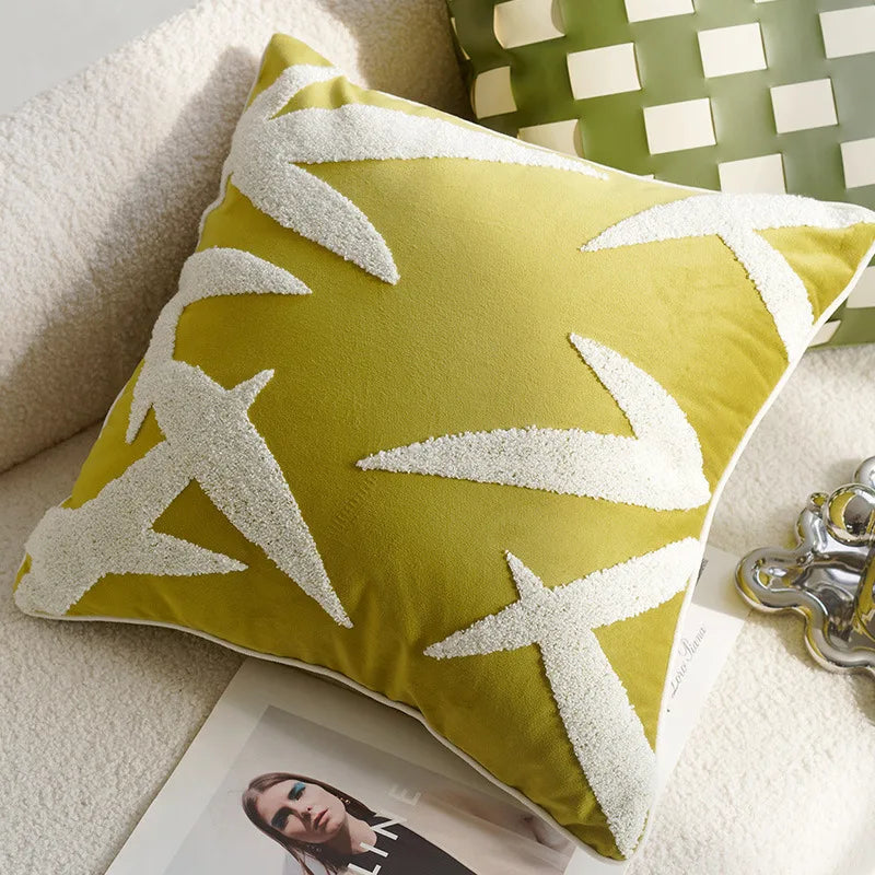 Green pillow with white star patterns on a light surface boho home decor, housewarming gift, embroidered pillow cover, flying bird cushion, animal pattern pillowcase, decorative throw pillow, Nordic cushion cover, luxury boho accent, sofa decor, nature-inspired pillow, canvas cushion case, textured home accessories