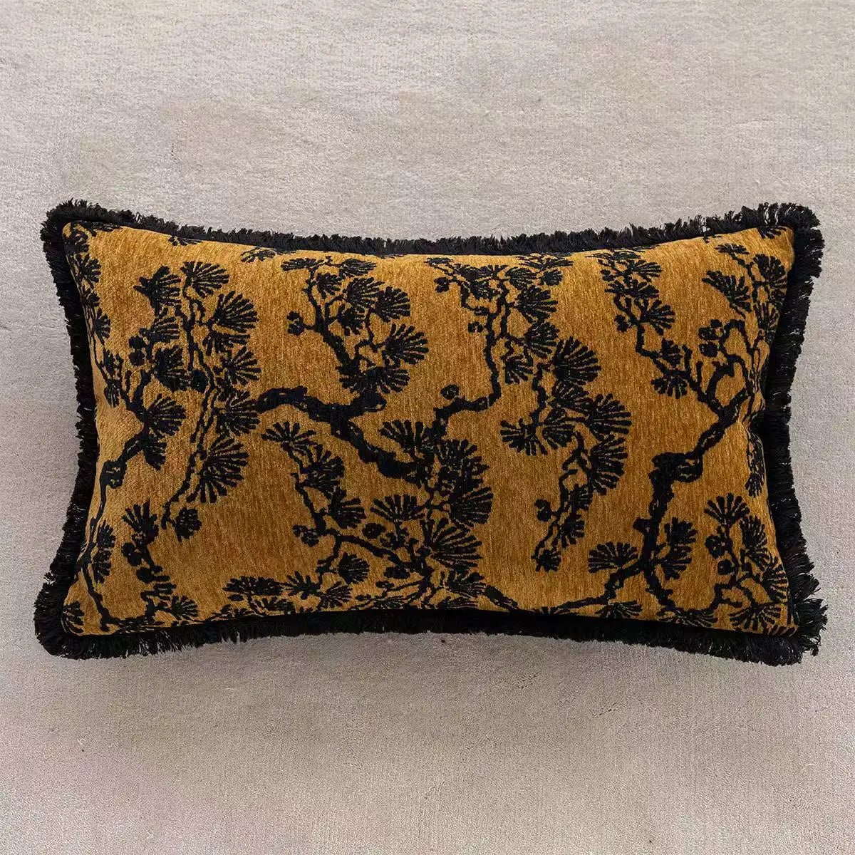 Decorative pillow with black floral pattern on mustard yellow background. embroidery throw pillow cover in boho modern style