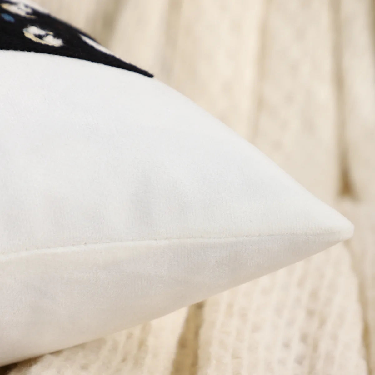 Close-up of a white pillow with a blurred background