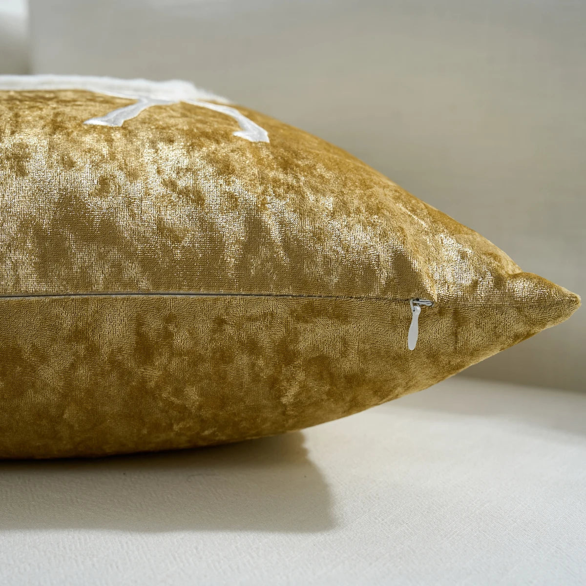 Gold velvet pillow on a light background. Christmas embroidered pillow cover in gold, 18x18 inch festive cushion case for sofa, bed, or holiday home décor. Christmas Gift Ideas
