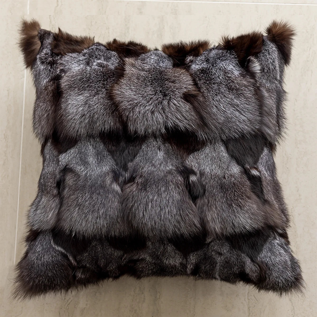 Fur throw blanket with a striped pattern on a beige background. embroidery throw pillow cover in boho modern style