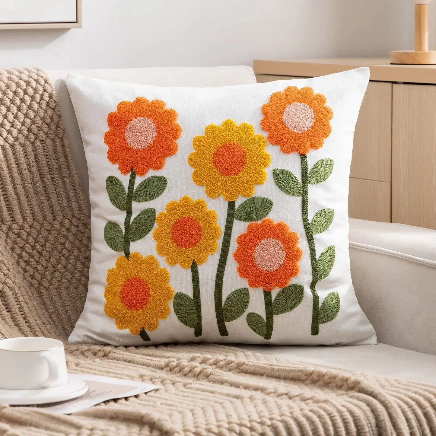 Decorative pillow with floral pattern on a couch Embroidered flower pillow cover, 17.7-inch square canvas cushion case with floral design for sofa, bed, and boho home decor