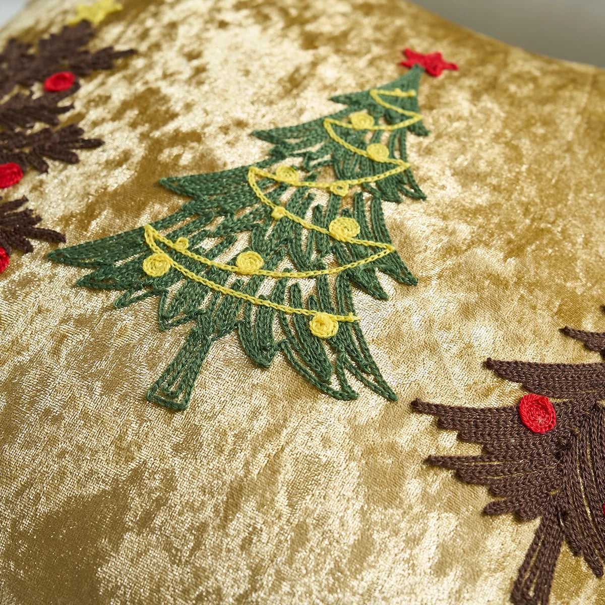 Embroidered design of a Christmas tree and reindeer on a textured fabric background. Christmas embroidered pillow cover in gold, 18x18 inch festive cushion case for sofa, bed, or holiday home décor. Christmas Gift Ideas