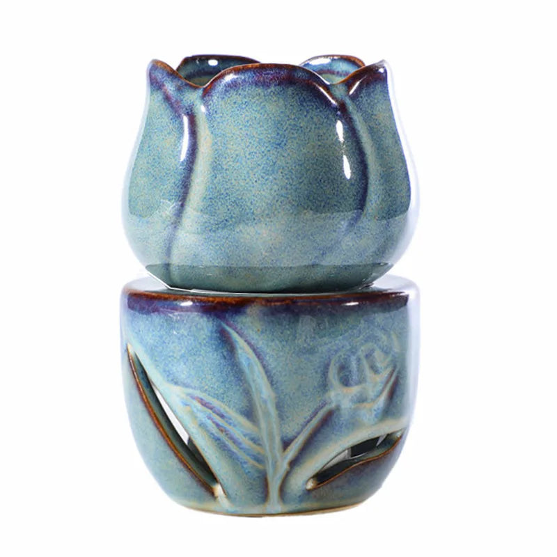 Ceramic tulip-shaped oil burner with a textured blue finish on a white background. tulip ceramic essential oil incense burner, candle-powered aroma diffuser for home fragrance and calming boho home décor