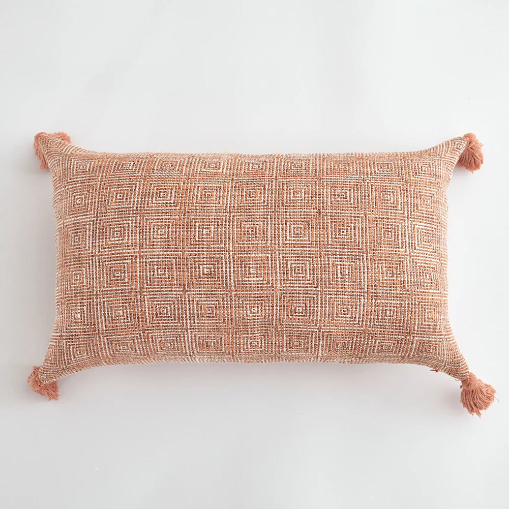 Orange linen tassels cushion cover styled on modern sofa, decorative boho throw pillow for living room, bed, or chair, perfect for cozy home vibes and housewarming gift ideas. Square and Rectangle.