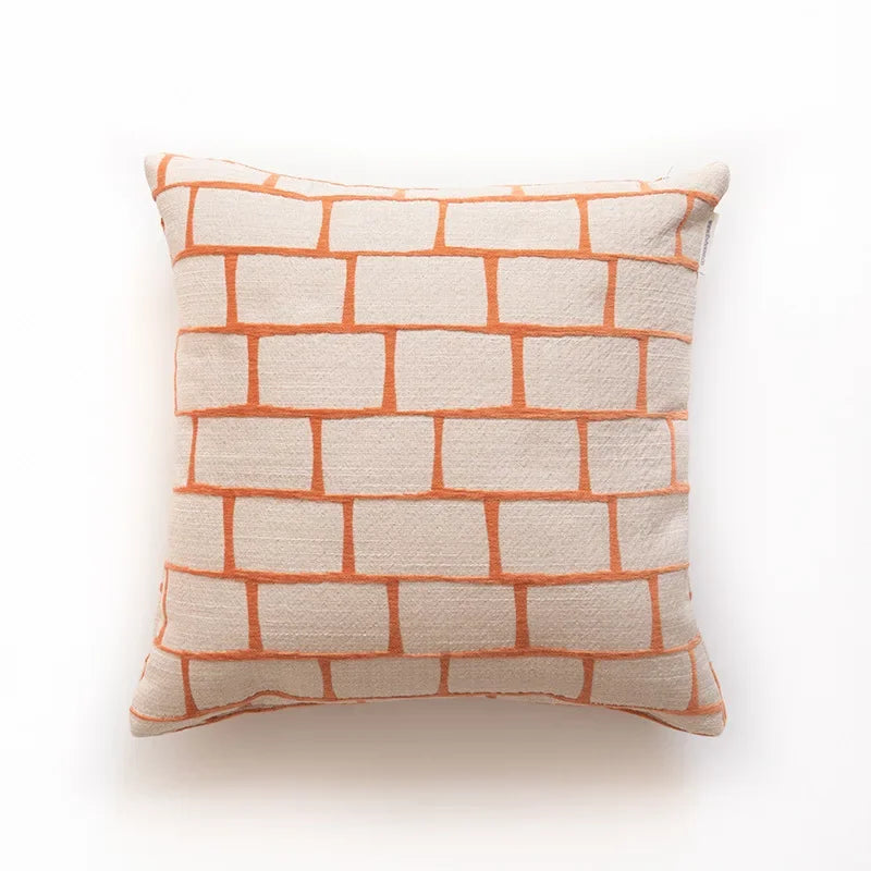 Decorative pillow with a geometric pattern on a white background