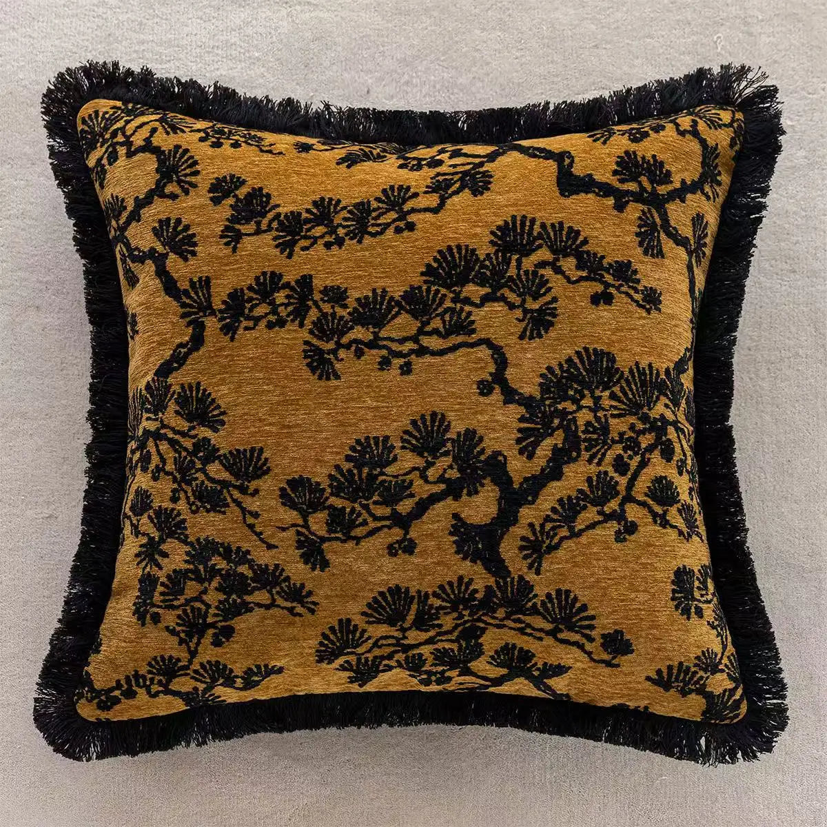 Decorative pillow with black floral pattern on a mustard background. embroidery throw pillow cover in boho modern style