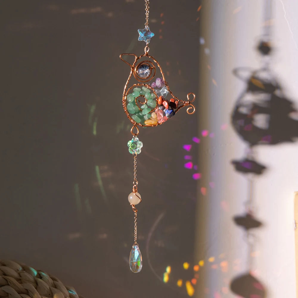 Decorative bird hanging ornament with colorful beads and gemstones against a blurred background boho home decor, crystal wind chime, sun catcher for windows, moon prism chime, agate stone hanging, garden art decor, patio hanging decoration, boho housewarming gift, spiritual gift, crystal suncatcher, balcony decor, meditation decor, handmade crystal chime