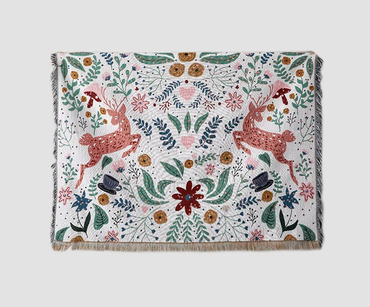 Decorative blanket with deer and floral pattern on a white background. Deer forest jacquard woven blanket with floral and woodland tapestry design – boho throw for sofa or bed, soft cotton blend decorative bedspread for cozy home décor.