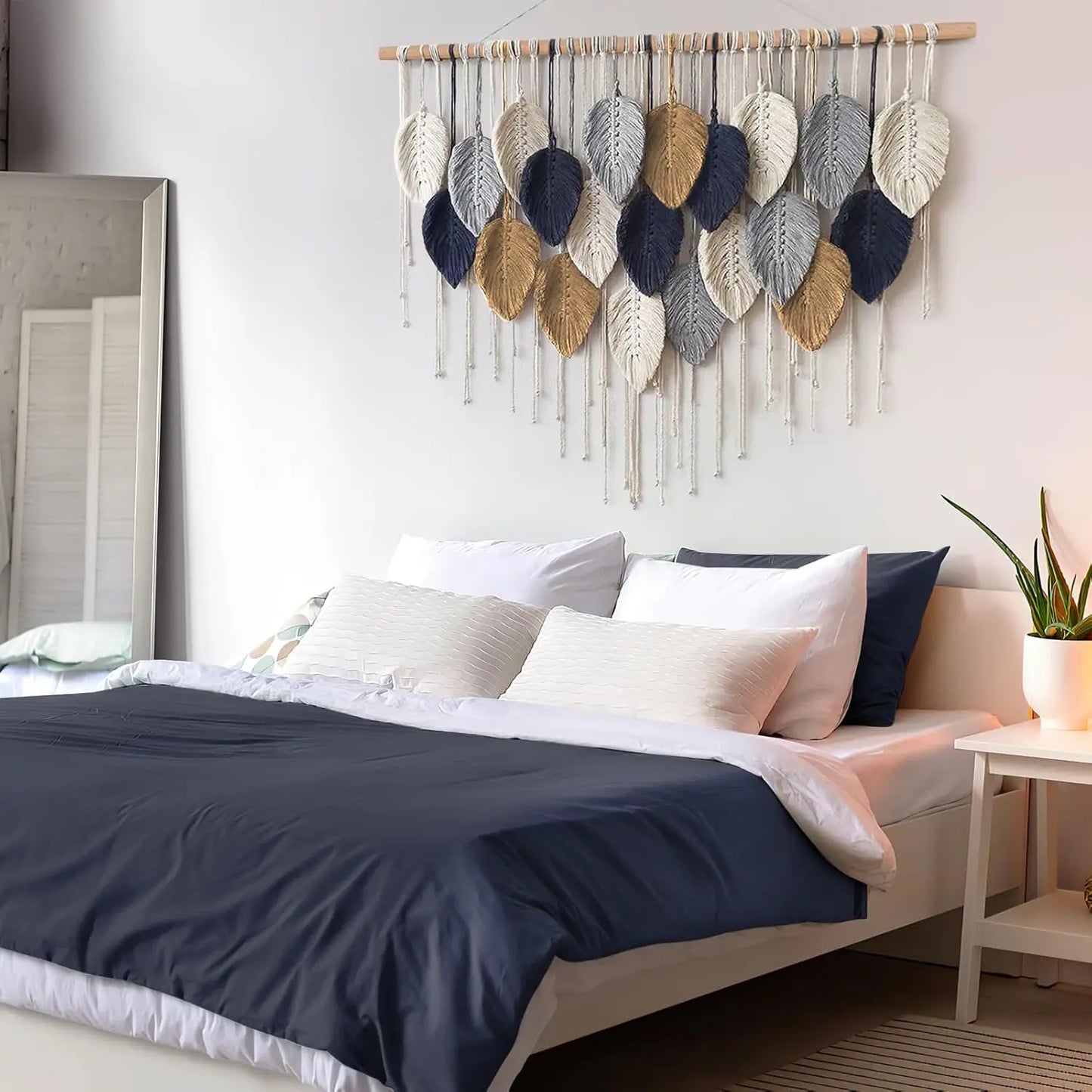 Bedroom with a decorative wall hanging above the bed