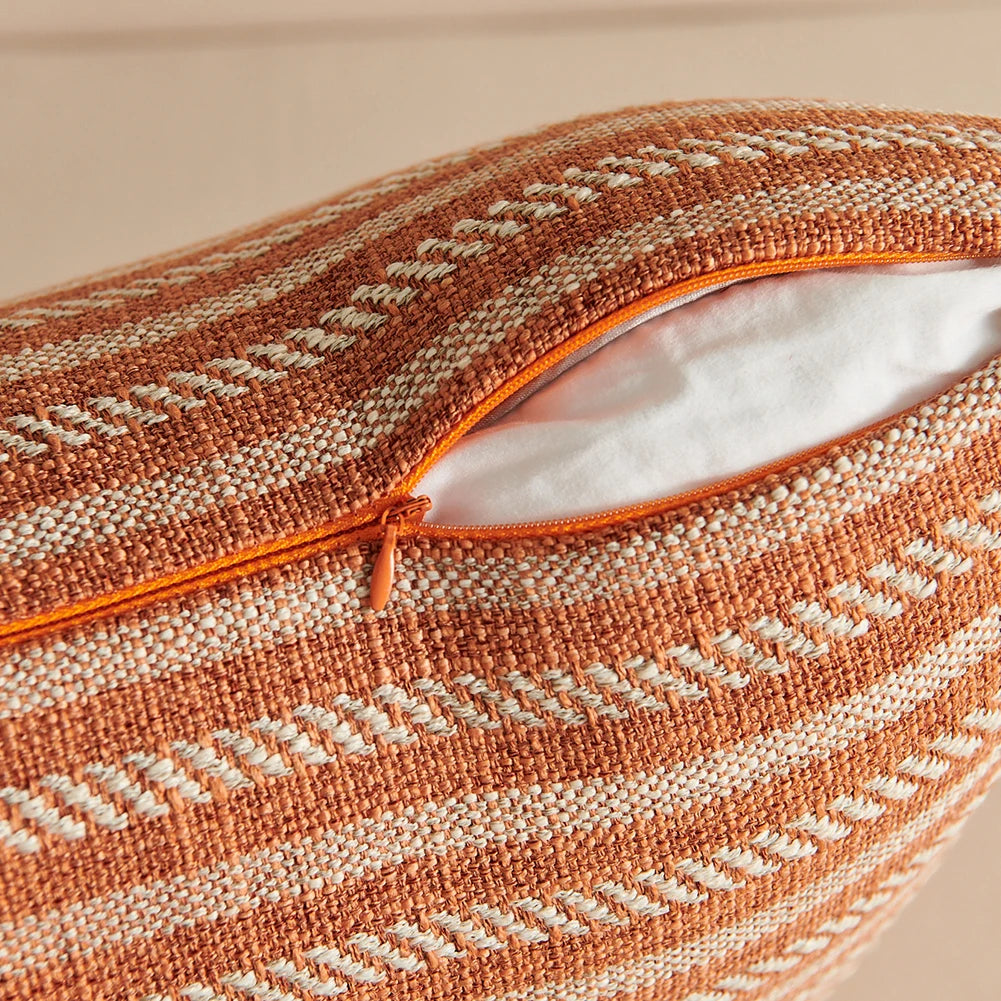 Orange linen tassels cushion cover styled on modern sofa, decorative boho throw pillow for living room, bed, or chair, perfect for cozy home vibes and housewarming gift ideas. Square and Rectangle.