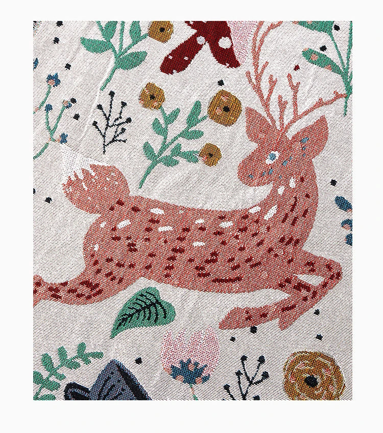 Decorative fabric with pink deer and floral patterns on a light background. Deer forest jacquard woven blanket with floral and woodland tapestry design – boho throw for sofa or bed, soft cotton blend decorative bedspread for cozy home décor.