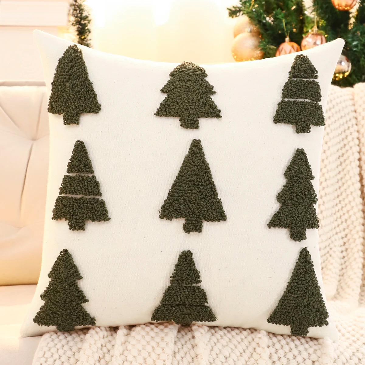 Decorative pillow with green tree patterns on a white background. Christmas embroidered pillow cover with tufted snowflake and reindeer design in 18x18 inches, festive canvas cushion case for sofa or bed