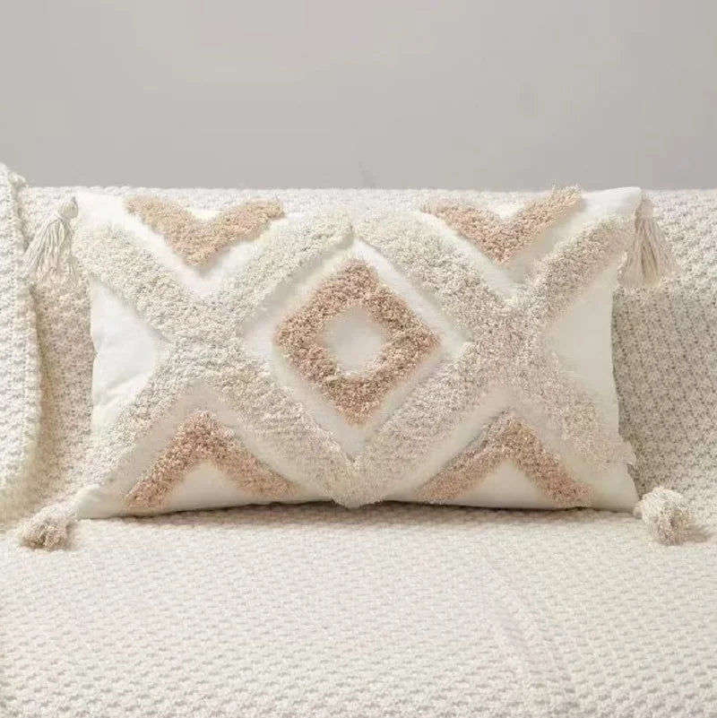 Decorative pillow with geometric pattern on a textured surface Nordic Bohemian geometric plush pillow cover with embroidered design and tassels, perfect for boho home decor on sofa, bed, or accent chair β cozy neutral cushion cover for living room or bedroom style