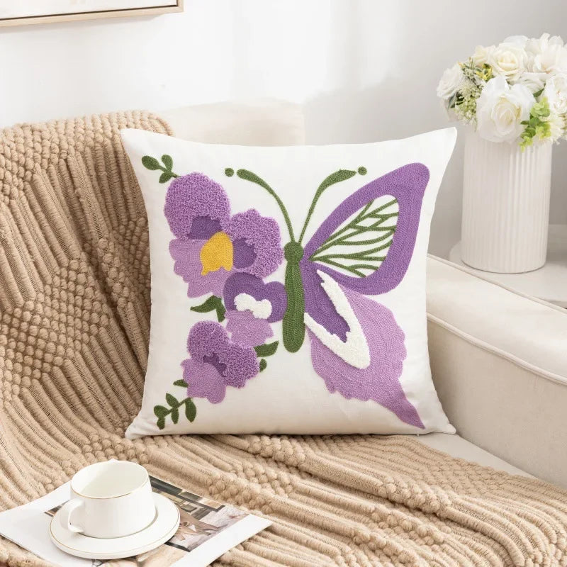 Decorative pillow with butterfly and flower design on a couch Embroidered flower pillow cover, 17.7-inch square canvas cushion case with floral design for sofa, bed, and boho home decor
