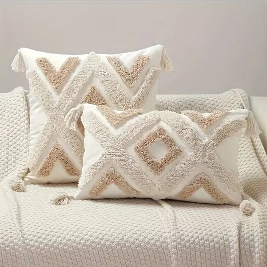 Decorative pillows with geometric patterns on a textured surface Nordic Bohemian geometric plush pillow cover with embroidered design and tassels, perfect for boho home decor on sofa, bed, or accent chair – cozy neutral cushion cover for living room or bedroom style