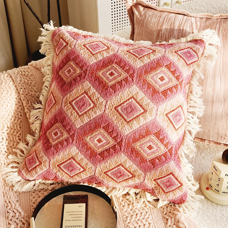 Decorative pillow with geometric pattern on a textured surface. Boho Home Decor.
