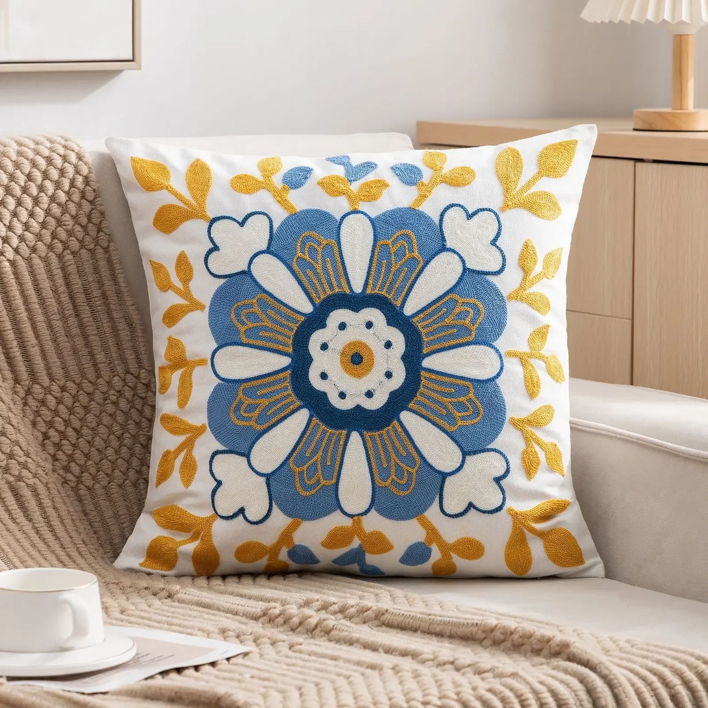 Decorative pillow with floral pattern on a couch Embroidered flower pillow cover, 17.7-inch square canvas cushion case with floral design for sofa, bed, and boho home decor