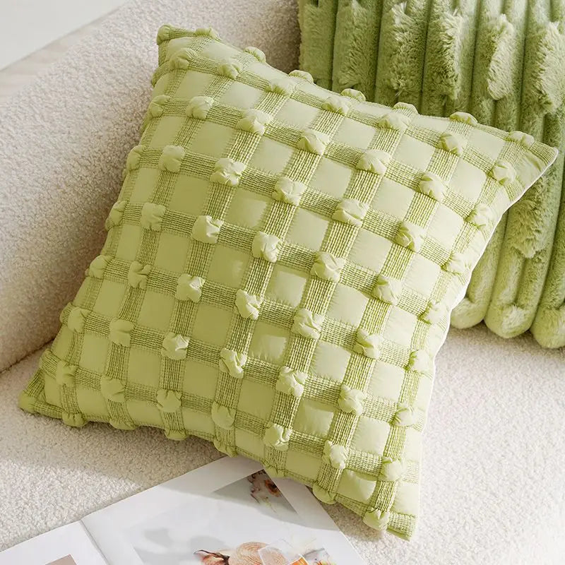 Green textured pillow on a couch with a blanket in the background boho home decor, housewarming gift, embroidered pillow cover, flying bird cushion, animal pattern pillowcase, decorative throw pillow, Nordic cushion cover, luxury boho accent, sofa decor, nature-inspired pillow, canvas cushion case, textured home accessories