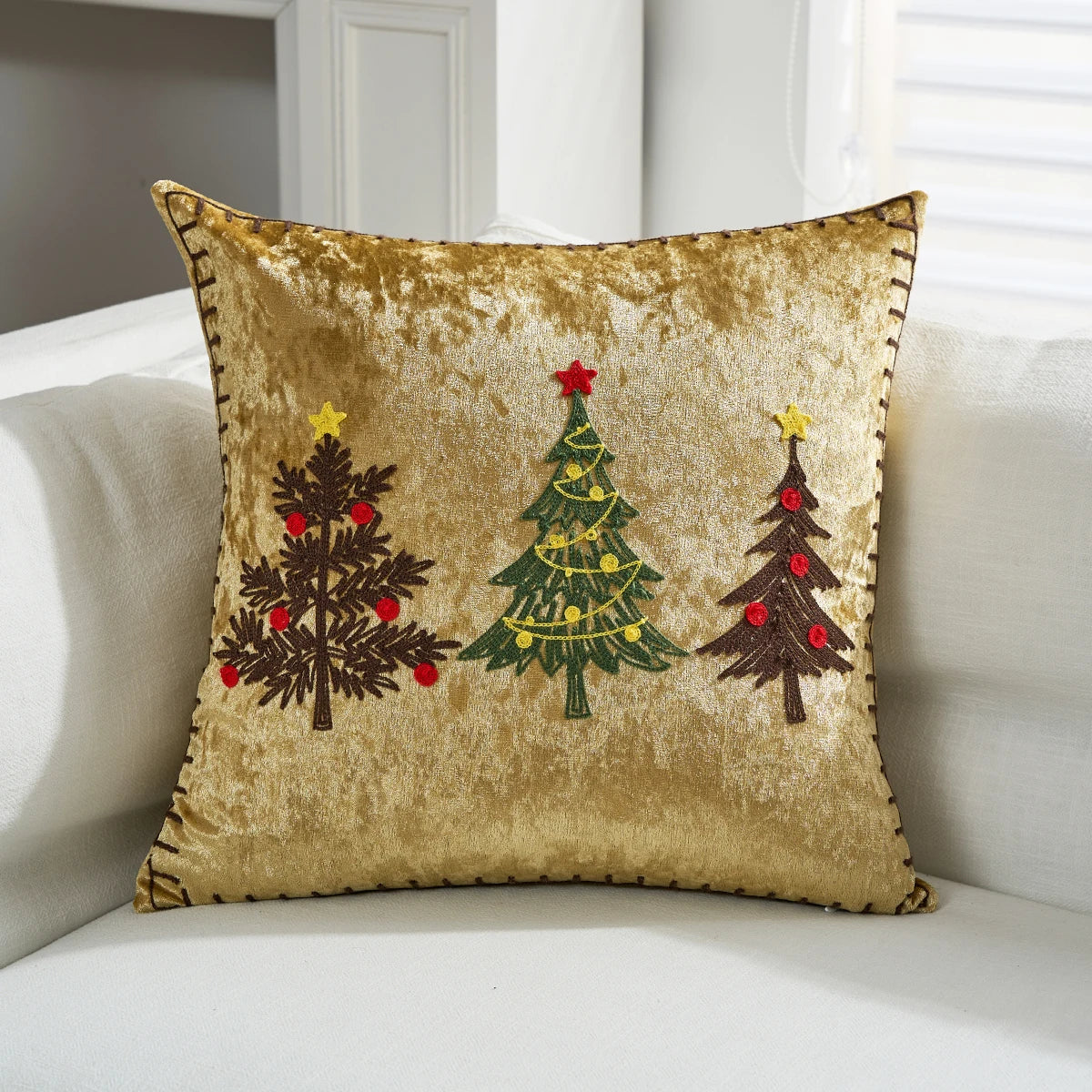 Decorative pillow with Christmas tree designs on a white couch. Christmas embroidered pillow cover in gold, 18x18 inch festive cushion case for sofa, bed, or holiday home décor. Christmas Gift Ideas