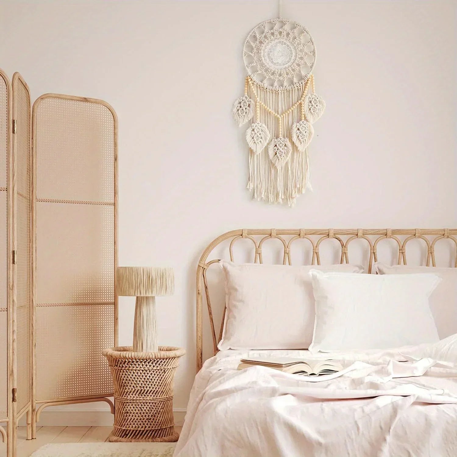 Dreamcatcher wall art over a boho bedroom