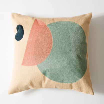 Decorative pillow with abstract shapes on a beige background Colorful abstract geometric embroidered cushion cover in cotton blend, decorative pillowcase for living room, kids’ room, or boho home decor.
