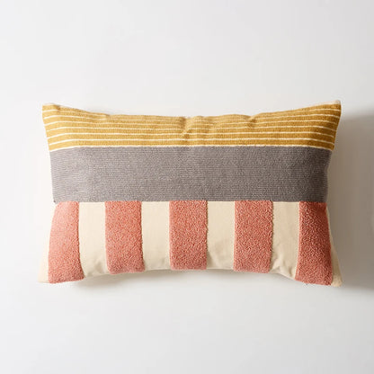 Striped pillow with yellow, gray, pink, and beige colors on a white background Colorful abstract geometric embroidered cushion cover in cotton blend, decorative pillowcase for living room, kids’ room, or boho home decor.