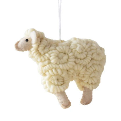 White sheep ornament hanging on a white background