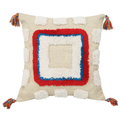 Decorative pillow with a red and blue square design on a beige background