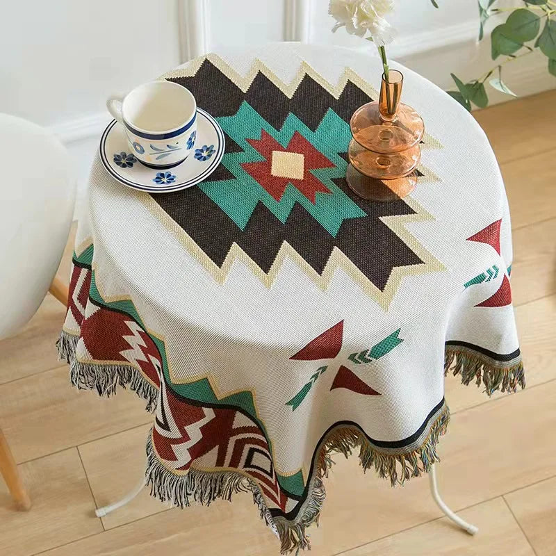 Boho geometric Aztec throw blanket with tassels, featuring earthy tones and a woven texture—perfect for cozy home decor