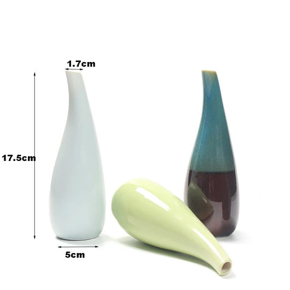 Three boho mini ceramic vases of different colors with measurements on a white background