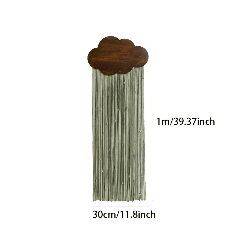 Decorative cloud-shaped wall art with tassels, showing dimensions on a white background.