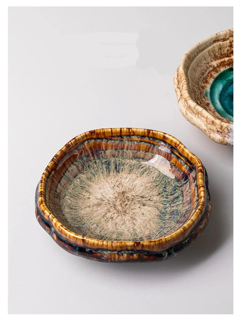 Ceramic bowl with embossed texture on a light gray background