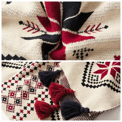 Textile with geometric patterns and tassels on a white background