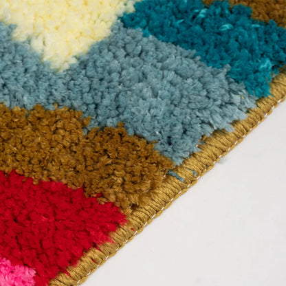Close-up of a colorful textured rug with geometric pattern on a white background boho home decor, bathroom rug, tufted bath mat, Get Naked rug, colorful shower mat, apartment decor, dorm bathroom accessories, housewarming gift, microfiber bath mat, fun bathroom rug, American style bath mat