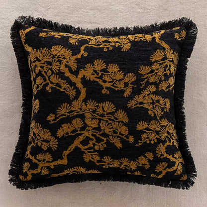 Decorative pillow with black and gold pattern on a neutral background. embroidery throw pillow cover in boho modern style