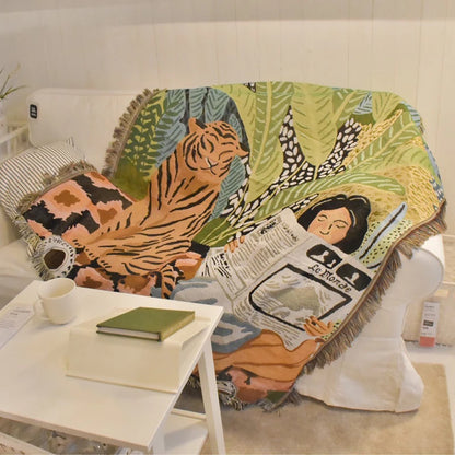 Decorative blanket with a tiger and woman design on a couch. Boho Home Decor. 