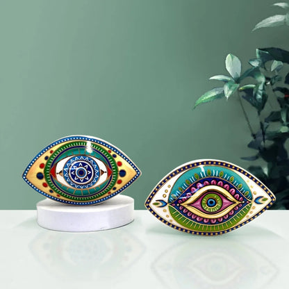 Moroccan Turkish blue evil eye ceramic figurine on display, unique bohemian home decor accent perfect for eclectic and boho home styles, adds soulful vibes and a cozy touch to any room, great for gifting as a boho home decor gift or housewarming present.