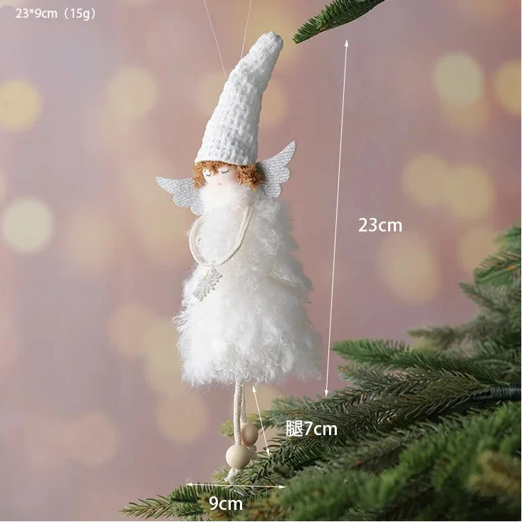 Decorative angel figure on a Christmas tree with measurements indicated.