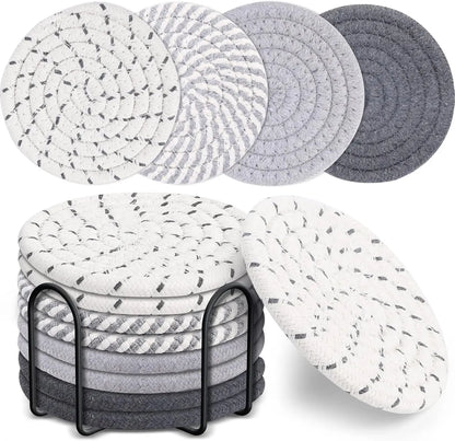 Set of round woven coasters in various patterns and colors on a white background. Set of cotton drink coasters – eco-friendly housewarming gift idea