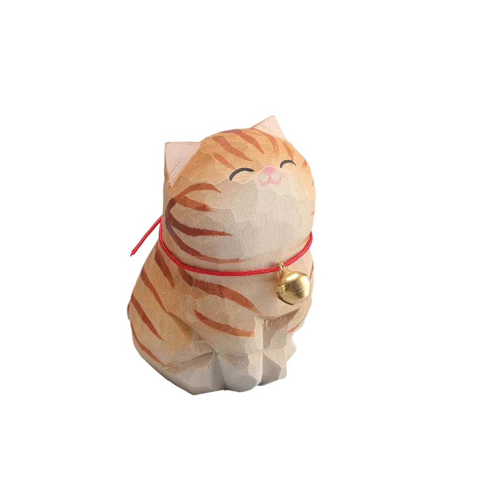 Cat-shaped paper bag with a gold bell on a white background