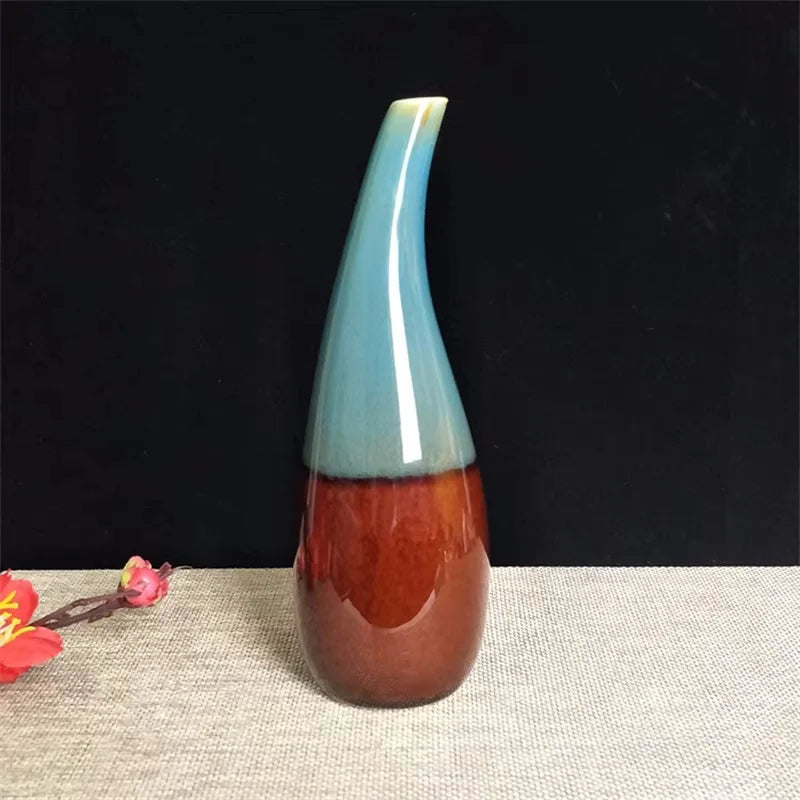 Boho Vase with blue and brown gradient on a textured surface with a dark background