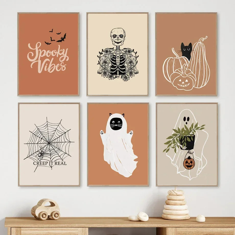 Set of six Halloween-themed wall art prints on a white wall above a wooden shelf.