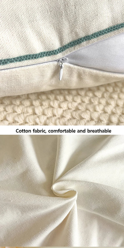 Close-up of a zipper on a pillow with cotton fabric shown below.